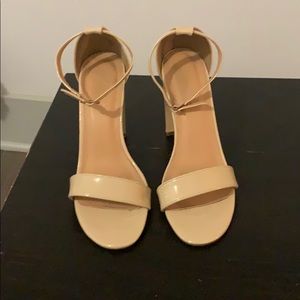 Nude patent leather high heeled sandal